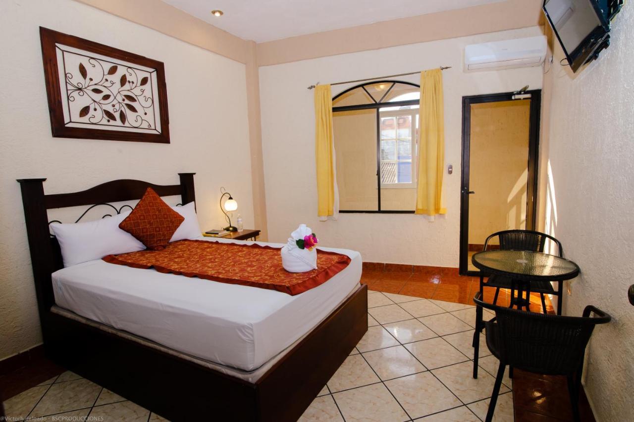 Hotel Quinta Maya Flores Extérieur photo