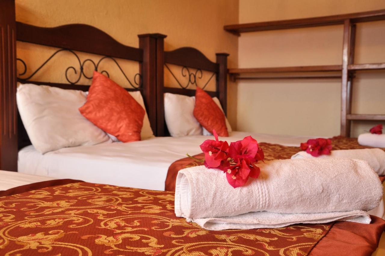 Hotel Quinta Maya Flores Extérieur photo