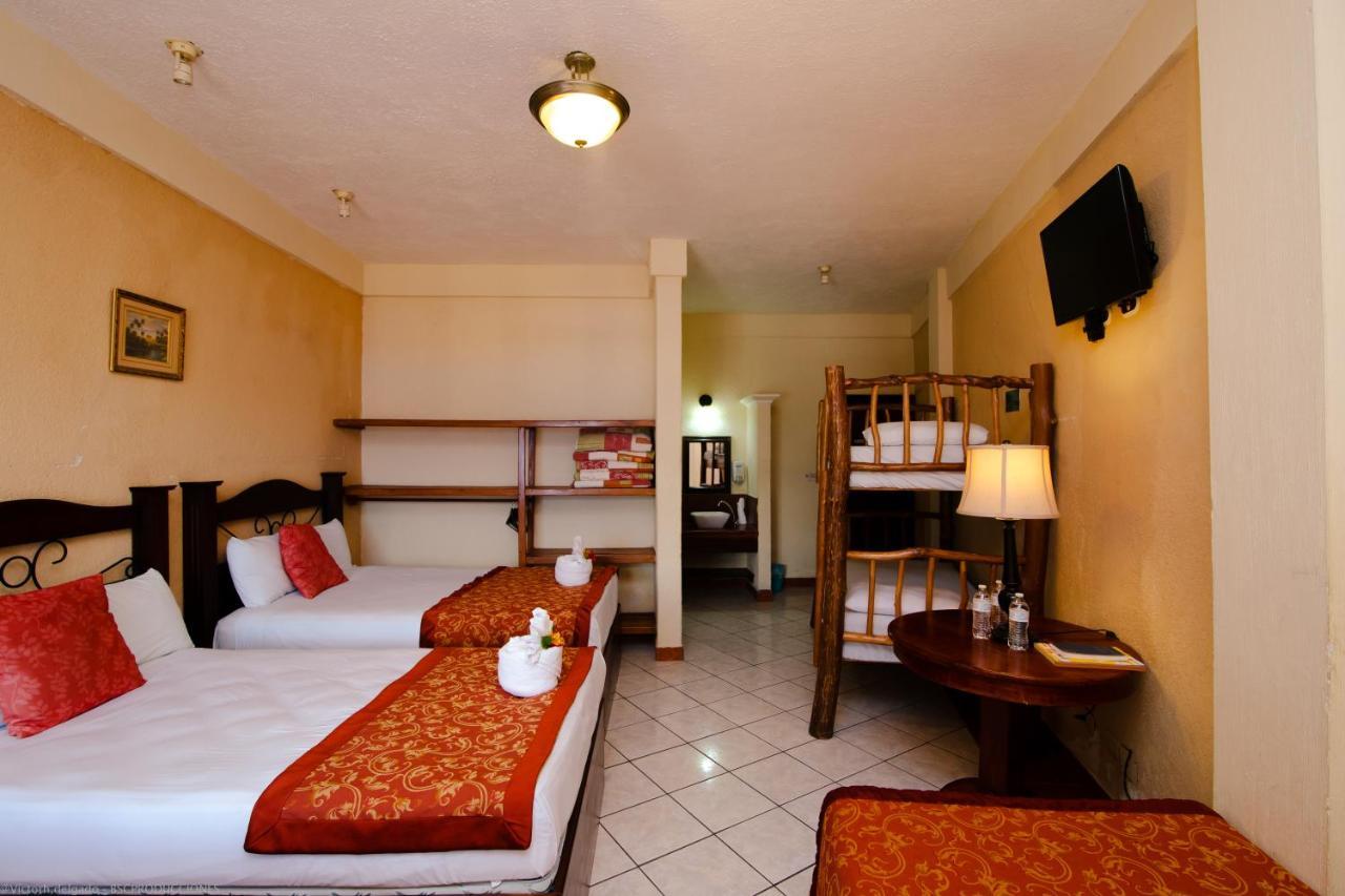 Hotel Quinta Maya Flores Extérieur photo