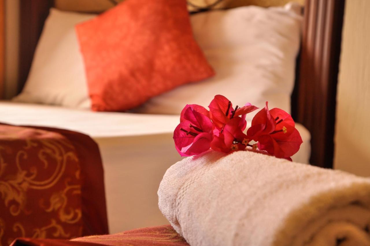 Hotel Quinta Maya Flores Extérieur photo