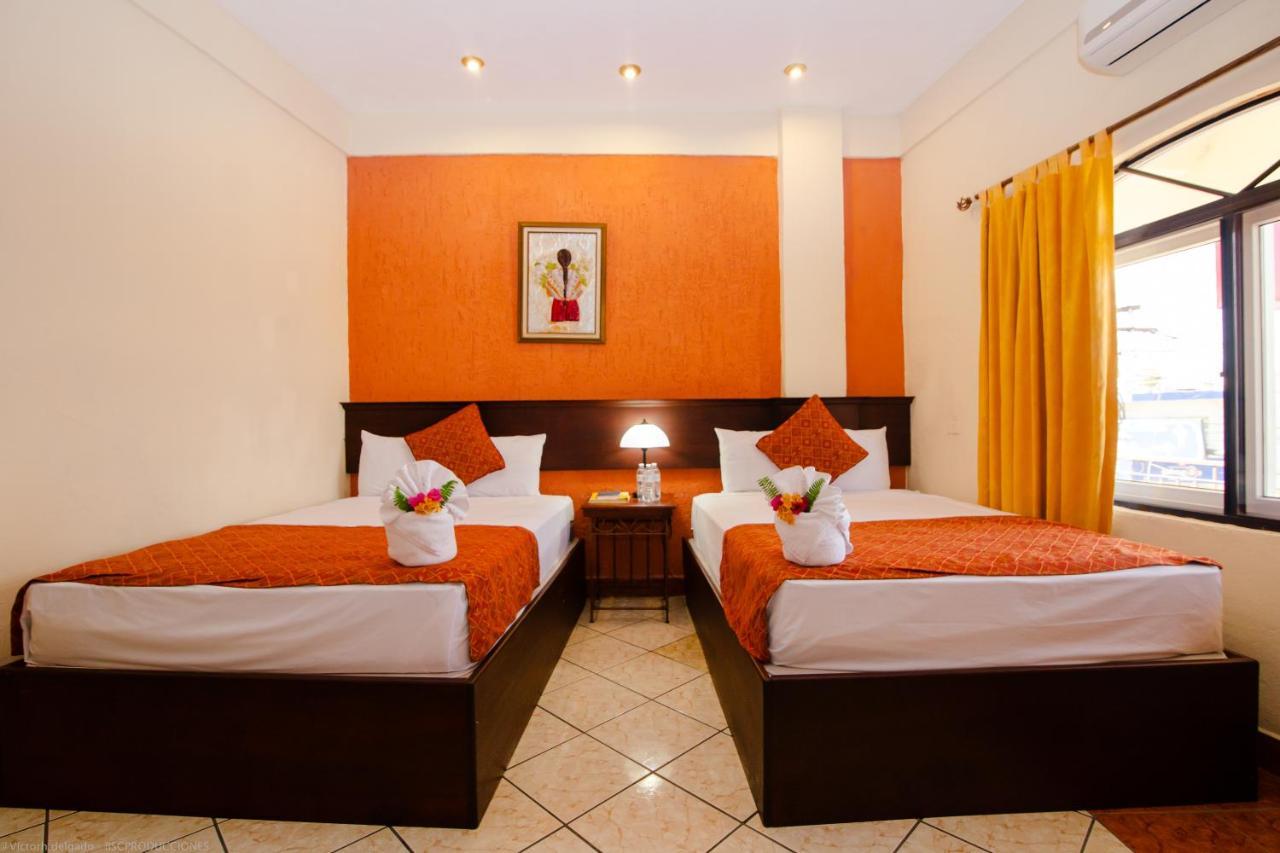 Hotel Quinta Maya Flores Extérieur photo
