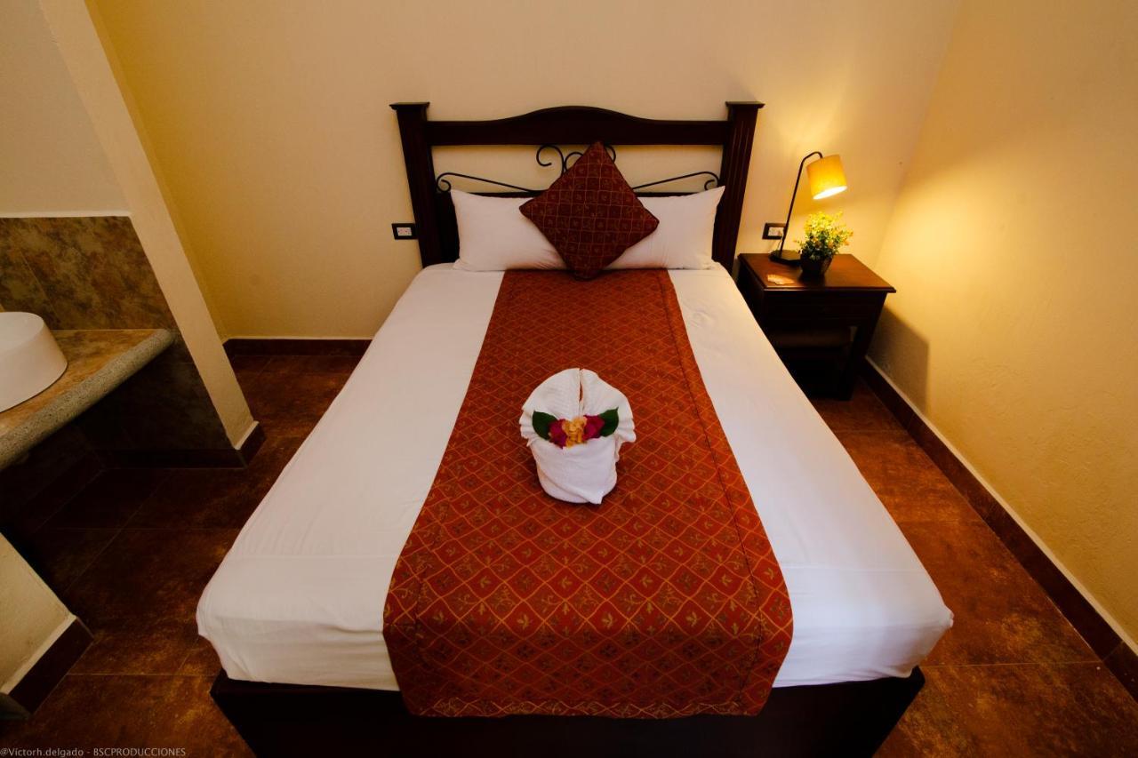Hotel Quinta Maya Flores Extérieur photo