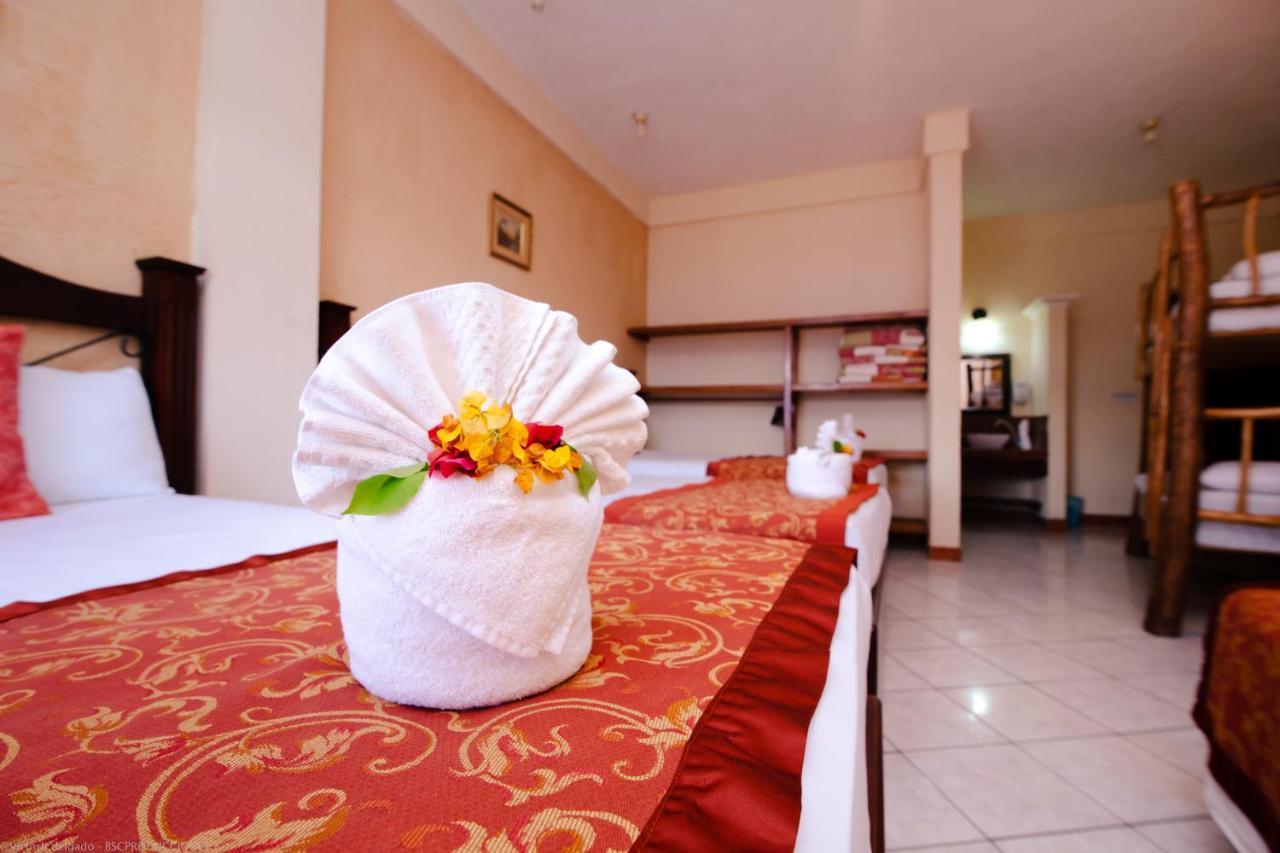 Hotel Quinta Maya Flores Extérieur photo