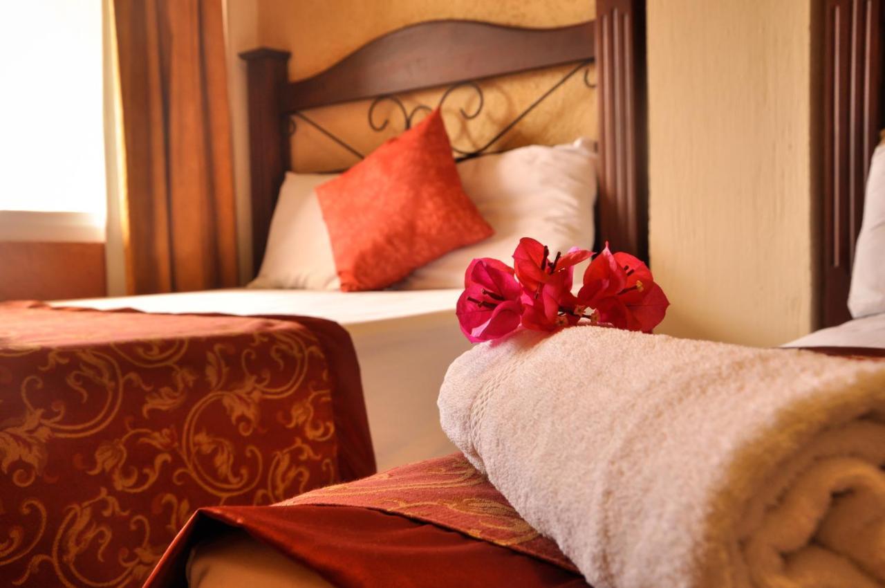 Hotel Quinta Maya Flores Extérieur photo