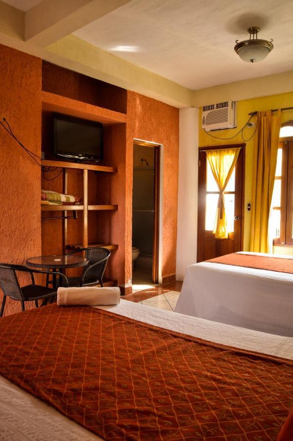 Hotel Quinta Maya Flores Extérieur photo