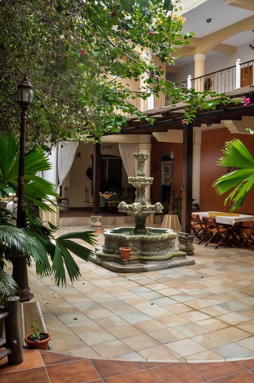 Hotel Quinta Maya Flores Extérieur photo