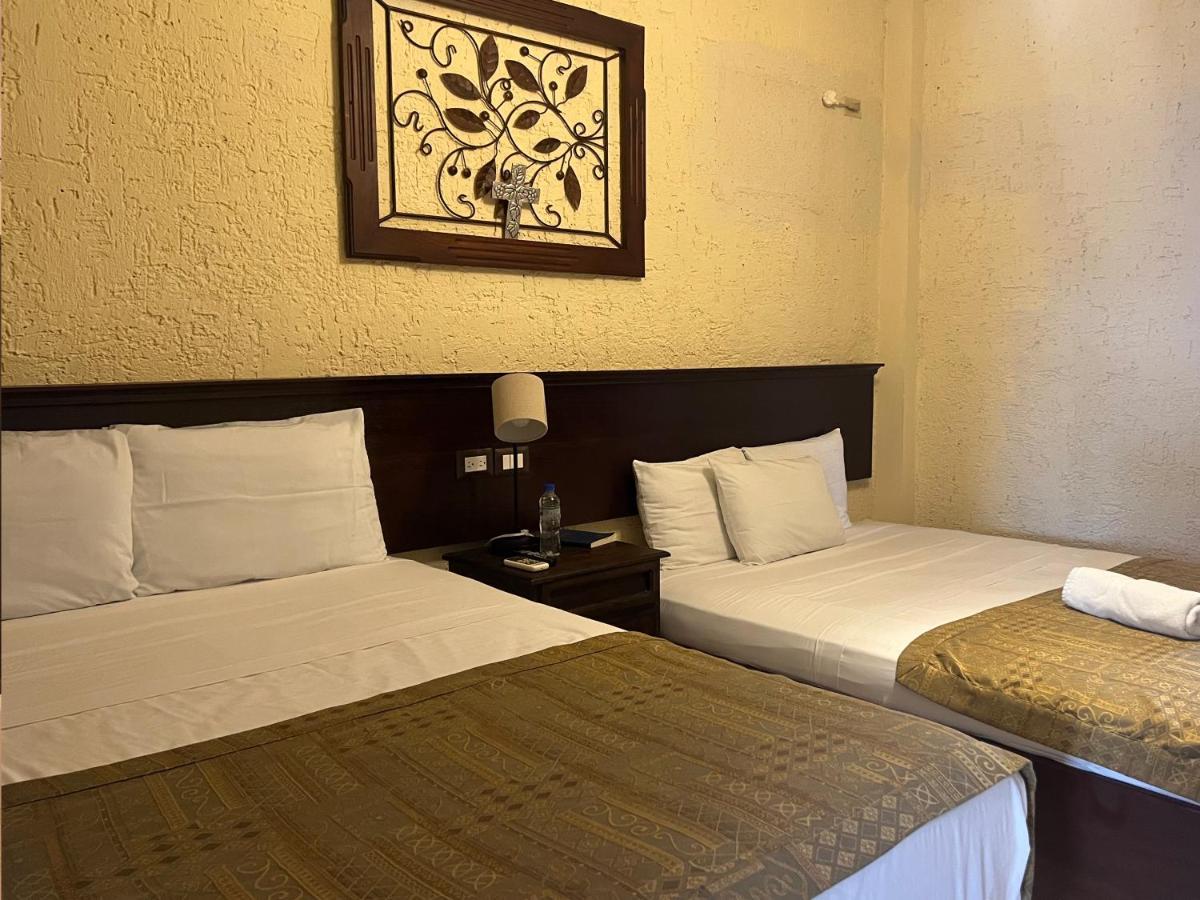 Hotel Quinta Maya Flores Extérieur photo