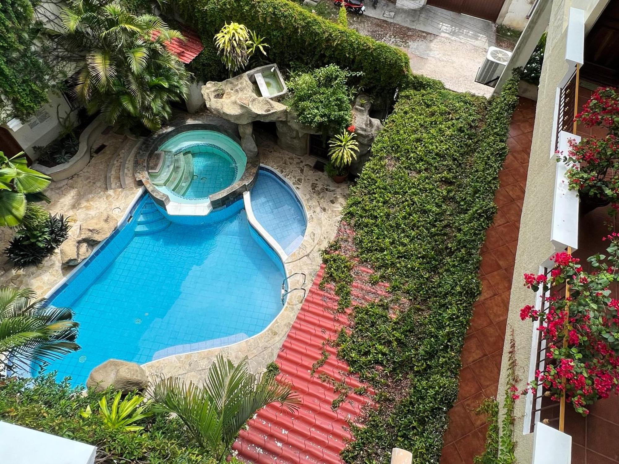 Hotel Quinta Maya Flores Extérieur photo