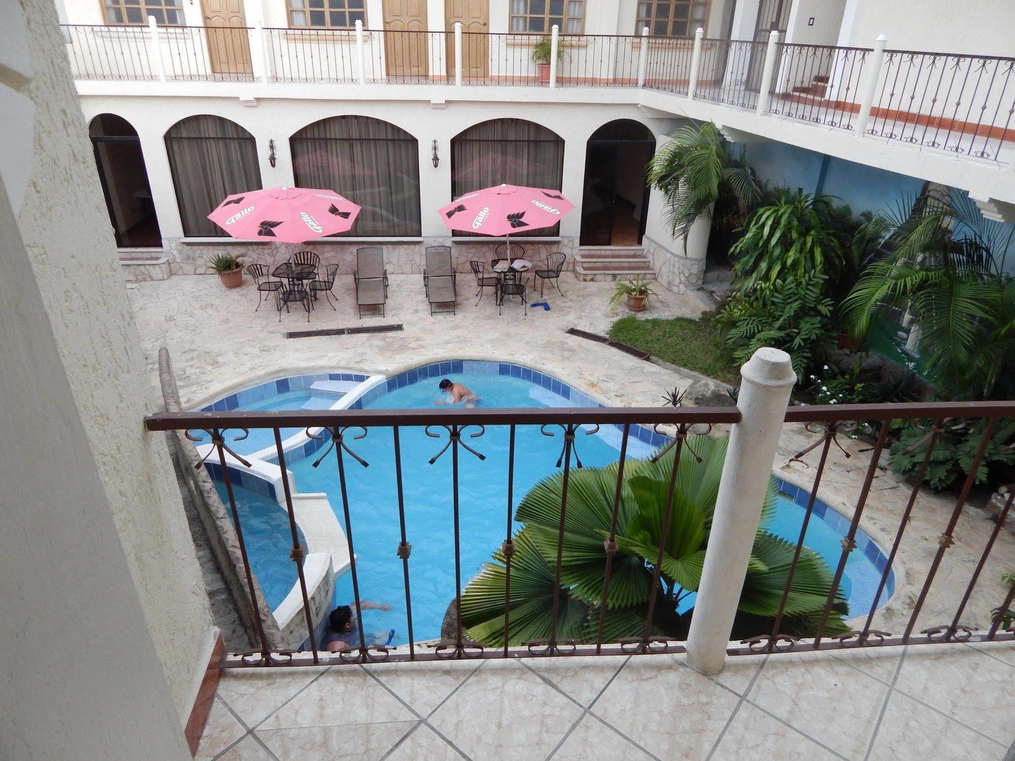 Hotel Quinta Maya Flores Extérieur photo