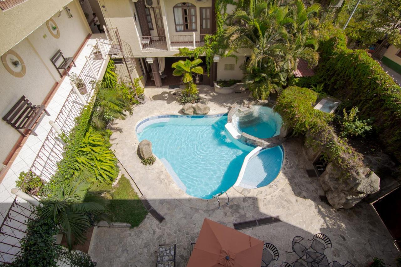Hotel Quinta Maya Flores Extérieur photo