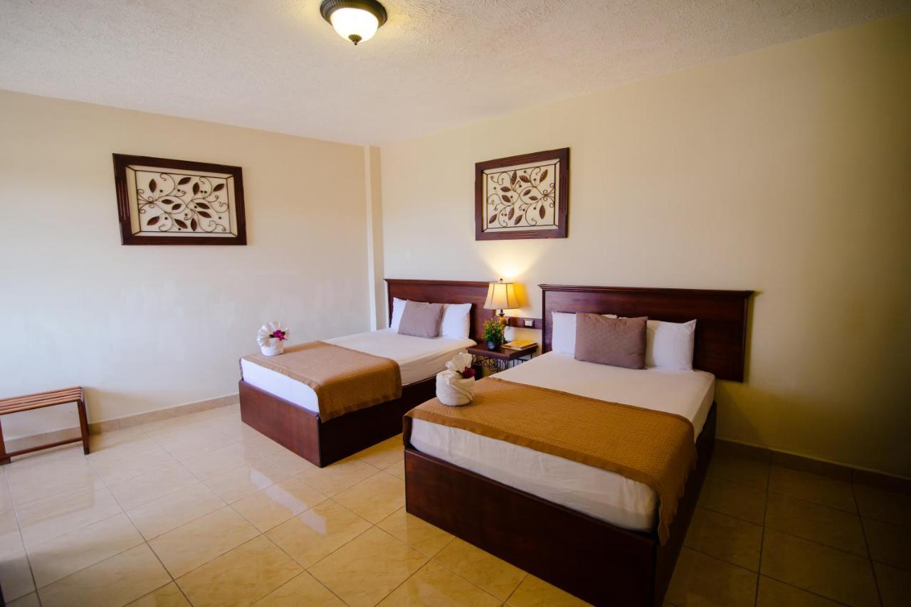 Hotel Quinta Maya Flores Extérieur photo