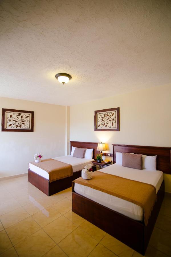 Hotel Quinta Maya Flores Extérieur photo