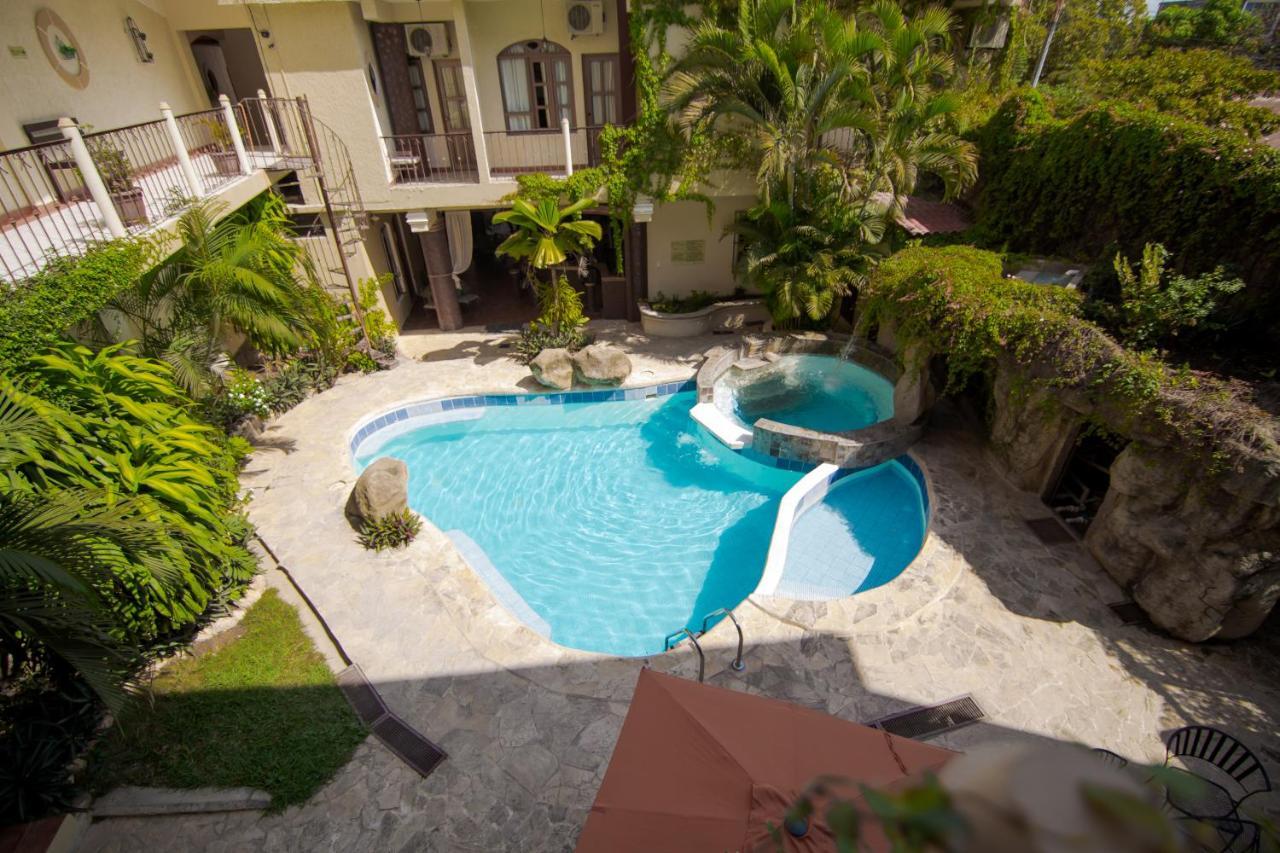Hotel Quinta Maya Flores Extérieur photo